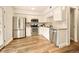 Well-equipped kitchen with stainless steel appliances, white cabinetry, and modern countertops at 1150 Inca St # 39, Denver, CO 80204