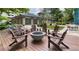 Inviting outdoor lounge area with a fire pit and comfortable seating, perfect for relaxation and social gatherings at 1150 Inca St # 39, Denver, CO 80204