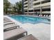 Enjoy the pool area with modern lounge chairs and a refreshing swimming experience at 1150 Inca St # 39, Denver, CO 80204