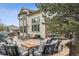 Outdoor space includes a large patio with a fire pit and comfortable seating to host friends and Gathering at 14417 W 57Th Pl, Arvada, CO 80002