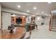 Finished basement includes a home theatre with built-ins and a bar for entertaining friends and Gathering at 14417 W 57Th Pl, Arvada, CO 80002