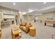 Spacious finished basement with a wet bar, recreation area, and plenty of room for entertaining or relaxing at 668 E Dry Creek Cir, Littleton, CO 80122
