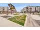 Charming community park featuring decorative trees, pathways, and benches, fostering a vibrant community atmosphere at 668 E Dry Creek Cir, Littleton, CO 80122