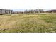 Scenic open field with modern apartments in the background, providing a sense of community and outdoor space at 668 E Dry Creek Cir, Littleton, CO 80122