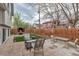 Backyard with a patio, stone fire pit, and lawn furniture at 45 Pierce St, Lakewood, CO 80226