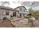 View of the backyard featuring a stone patio, grill and outdoor entertaining space at 45 Pierce St, Lakewood, CO 80226
