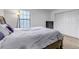 Comfortable bedroom with ensuite bath, plush carpet and large closet at 45 Pierce St, Lakewood, CO 80226