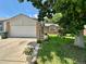 Charming single Gathering home featuring a two-car garage and a well-maintained front yard at 45 Pierce St, Lakewood, CO 80226