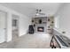 Cozy living room with fireplace, ceiling fan, neutral paint and plush carpet at 45 Pierce St, Lakewood, CO 80226