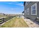 A spacious backyard with a well-maintained lawn, a privacy fence, and an inviting patio area for outdoor enjoyment at 6677 Crossbridge Cir, Castle Rock, CO 80108