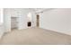 Spacious bedroom featuring carpet floors, and multiple doorways at 6677 Crossbridge Cir, Castle Rock, CO 80108