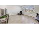 Well-lit room with hardwood floors, a comfortable chair, and large windows for lots of natural light at 6677 Crossbridge Cir, Castle Rock, CO 80108