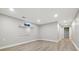 Finished basement with laminate flooring, recessed lighting and ample room at 334 S Revere St, Aurora, CO 80012