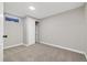 Bedroom features neutral walls and carpet, a recessed light fixture, and a closet with a sliding door at 334 S Revere St, Aurora, CO 80012