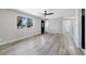 Bright, open living room featuring modern floors and abundant natural light at 334 S Revere St, Aurora, CO 80012