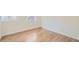 Well-lit bedroom featuring wood-look flooring, fresh paint, and ample natural light at 1764 W Atlantic Pl, Denver, CO 80223