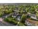 Aerial view showcases the property's lush surroundings and neighborhood charm at 6801 W 52Nd Ave, Arvada, CO 80002