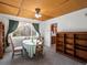 Bright dining area features a beautiful light fixture and nice backyard view, perfect for everyday meals at 6801 W 52Nd Ave, Arvada, CO 80002