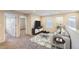 Bright living room with neutral carpet and modern decor at 2032 Spruce St, Denver, CO 80238