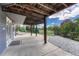 The home has a covered concrete patio and a decorative rock landscape in the backyard at 3630 Sawgrass Trl, Castle Rock, CO 80109
