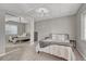 Bedroom with carpet, modern light fixture, mirrored closet and accent furniture at 3630 Sawgrass Trl, Castle Rock, CO 80109