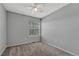 Bedroom featuring neutral carpet, ceiling fan, and a bright window at 3630 Sawgrass Trl, Castle Rock, CO 80109