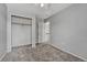 Bedroom featuring neutral carpet, closet, and entry to a hallway at 3630 Sawgrass Trl, Castle Rock, CO 80109