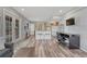 Living space with hard surface floors, small kitchen, and work space at 3630 Sawgrass Trl, Castle Rock, CO 80109