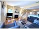 Inviting living room with a fireplace and open floor plan at 18766 E Yale Cir # A, Aurora, CO 80013