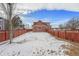 Spacious fenced-in backyard perfect for pets or children to play in a neighborhood setting at 225 Longspur Dr, Brighton, CO 80601