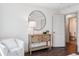 Comfortable bedroom with hardwood floors and stylish accents offers a bright and welcoming atmosphere at 31607 Broadmoor Dr, Evergreen, CO 80439