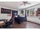 Unique bedroom is complete with hardwood floors, and a variety of posters and wall art at 31607 Broadmoor Dr, Evergreen, CO 80439
