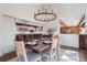 Elegant dining room adjacent to the kitchen, perfect for entertaining guests at 31607 Broadmoor Dr, Evergreen, CO 80439