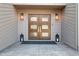 Charming front entryway with double doors, sconces, and stylish details creating a welcoming entrance at 31607 Broadmoor Dr, Evergreen, CO 80439