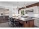 Beautiful kitchen with stainless steel appliances, large island, and plenty of counter space at 31607 Broadmoor Dr, Evergreen, CO 80439