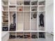 Well-organized mudroom with ample storage, hooks, and space for shoes and gear at 31607 Broadmoor Dr, Evergreen, CO 80439