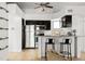 Contemporary kitchen with stainless steel appliances and granite countertops with barstool seating at 11109 Alcott St # D, Westminster, CO 80234