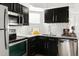 Bright kitchen with stainless steel appliances, granite countertops, and white subway tile backsplash at 11109 Alcott St # D, Westminster, CO 80234