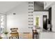 Living area including bar with granite countertops, and interesting wall design at 11109 Alcott St # D, Westminster, CO 80234