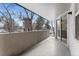 Private balcony overlooking trees and city at 601 W 11Th Ave # 109, Denver, CO 80204