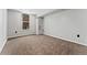 Bright bedroom with carpet and large window at 601 W 11Th Ave # 109, Denver, CO 80204