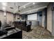 Private theater room with comfortable seating and a large screen at 601 W 11Th Ave # 109, Denver, CO 80204