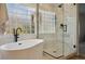 Luxurious bathroom with a soaking tub, glass-enclosed shower, tile accents, and modern fixtures at 4763 Laurelglen Ln, Highlands Ranch, CO 80130