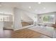 Bright loft features wood floors, modern lighting, and space for work and play at 4763 Laurelglen Ln, Highlands Ranch, CO 80130