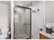 Modern bathroom features a tiled shower and updated fixtures at 5115 E Davies Dr, Centennial, CO 80122