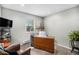 Office space with plenty of sunlight, carpet flooring, and neutral paint at 5115 E Davies Dr, Centennial, CO 80122