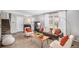 Cozy living room featuring soft textures, a comfortable sofa, and stylish accent pillows at 5115 E Davies Dr, Centennial, CO 80122