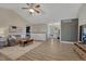 Bright living room with vaulted ceiling, modern floors, and open layout at 1572 W Long Ave, Littleton, CO 80120
