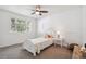 Bright bedroom with white accents, natural light, and a cozy atmosphere at 18355 W 59Th Dr, Golden, CO 80403