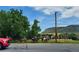 Group of people horseback riding along the road with beautiful scenery and a red truck passing by at 18355 W 59Th Dr, Golden, CO 80403
